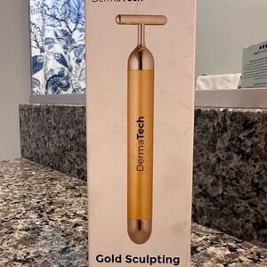 Gold Sculpting Tool for Radiant Skin